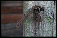 Old padlock in ruin